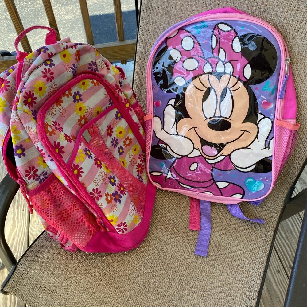 One NWT backpack, and one slightly used backpack both in great condition